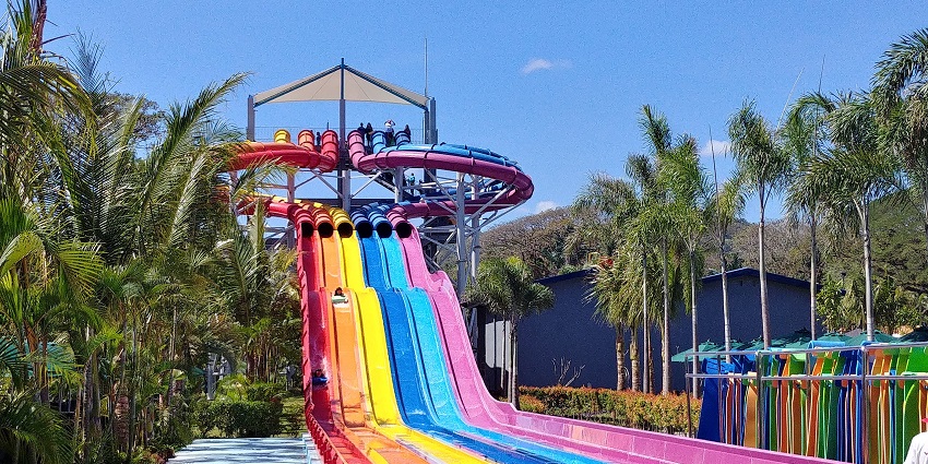 Visitors enjoying water attractions at Aqua park, one of the best places in Anand Sagar