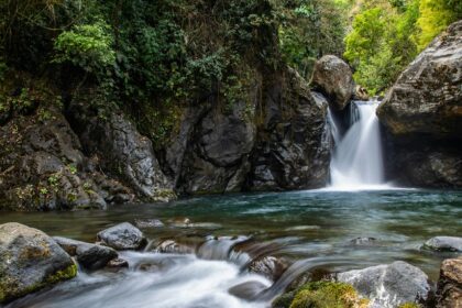 A beautiful landscape of a cascading beauty near Maharashtra surrounded by greenery.