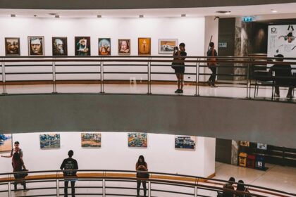 Image of people exploring an Art Gallery - Colaba in Mumbai is home to many renowned art galleries