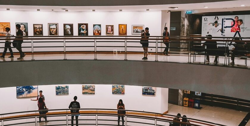 Image of people exploring an Art Gallery - Colaba in Mumbai is home to many renowned art galleries