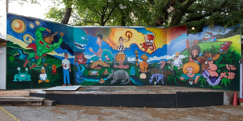 An image of the vibrant Art Ichol in Maihar, showcasing artists at work in a serene setting.