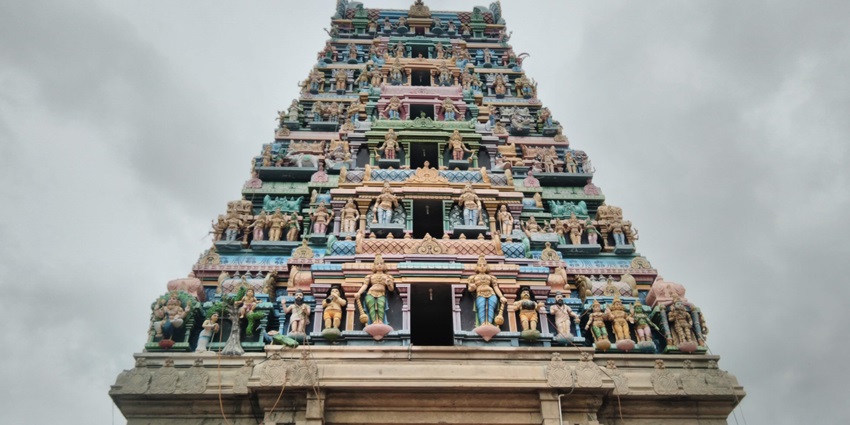 Image of a Arulmigu temple standing tall againta clear blue sky - one of the best places to visit in Ramanathapuram