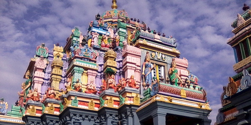 The Ashtalakshmi Temple, dedicated to Goddess Lakshmi, radiates peace along the coastline.