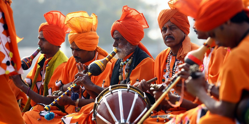 A glimpse of a group of people creating music with different musical instruments.