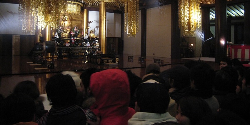 People gathered in the main ballroom of BVLD for a New Year celebration with a lively vibe.