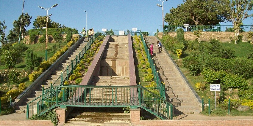 Bahu Fort and Garden is a scenic place to visit near Jai Water Park with terraced landscapes