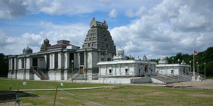 A picture of a temple taken from a distance during daytime