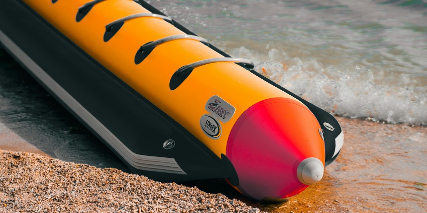 A picture of a banana boat lying on the beach, one of the best Chivla Beach Sea Water Sports to perform.