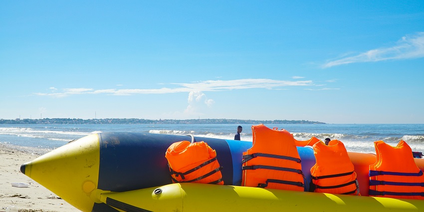 A picture of a group enjoying a thrilling banana boat ride at Alibaug Beach, Maharashtra.