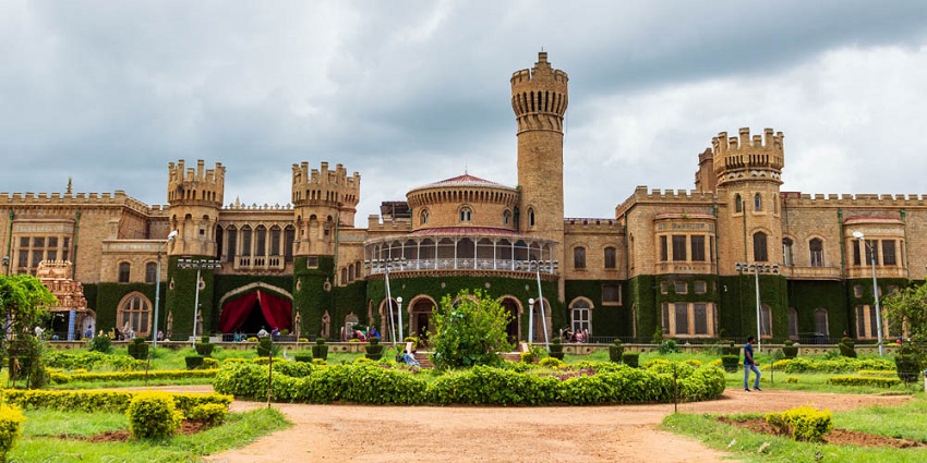 The historical Bangalore Palace with wooden carvings and Tudor-style architecture.
