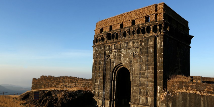 Panoramic view of the Bankot Fort with the clear sunny sky in the background near the Suvarnadurg Fort