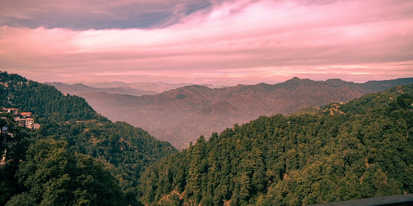 Picturesque view of the hills of Barog adorned with pink sunset hues