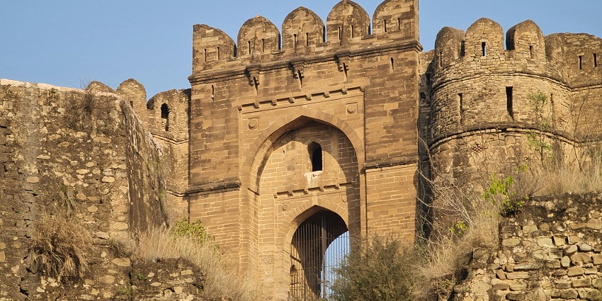 Image of an ancient fort gate with historical significance, view during the day time