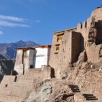 Image of Basgo Monastery Gompa Ladakh, surrounded by mountains under clear blue sky