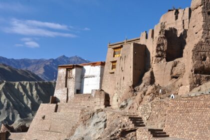 Image of Basgo Monastery Gompa Ladakh, surrounded by mountains under clear blue sky