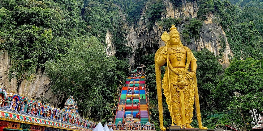 Stairway leading to Batu Caves, home to a famous Lord Murugan statue in Malaysia.
