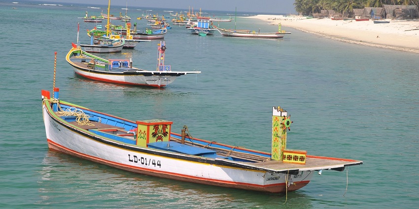 An image of traditional boats are all set for tourists and locals for the beach festival.