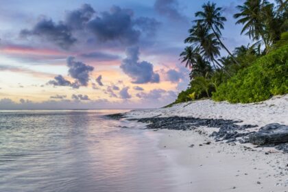 Image of a colorful beach, the sand near the waterline at a beach