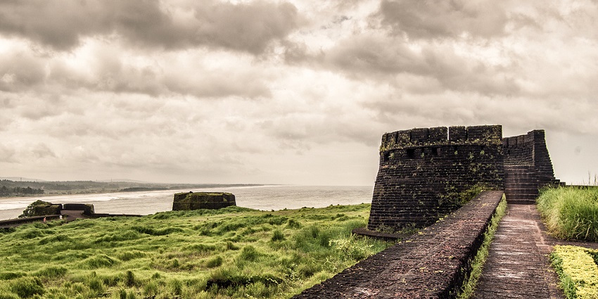 The walls and entrance of Bekal Fort, a place to visit near Dharmasthala.