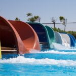 Outdoor water park and activities at a military-themed adventure park in Gurgaon.