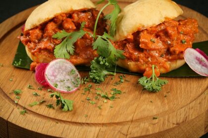 A round food platter is served on the table, which consists of a variety of dishes.