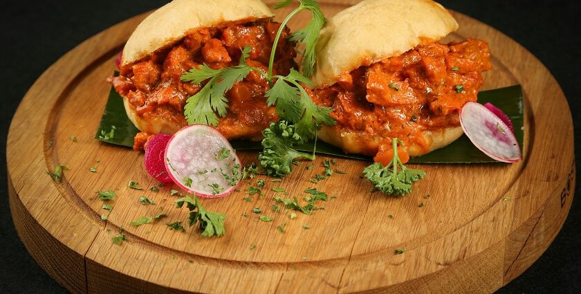 A round food platter is served on the table, which consists of a variety of dishes.