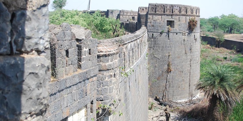 Fort bastions adorned in winter, showcasing historic architecture against a serene backdrop