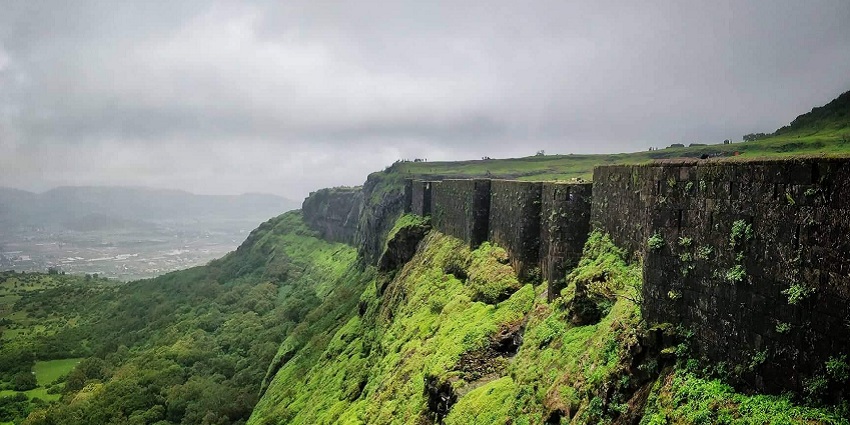 An image of lush green landscapes during the best time to visit Visapur Fort trekking.