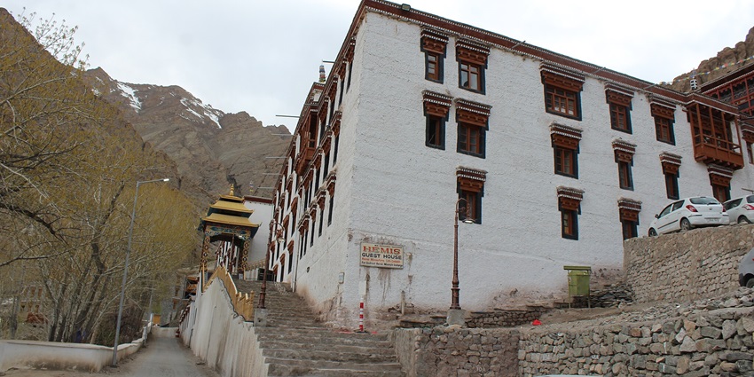 Hemis Monastery in Ladakh, featuring stunning architecture against a clear blue sky.