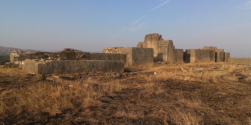Ruined palace of Maharana Pratap at Chavand with stone walls and arched windows