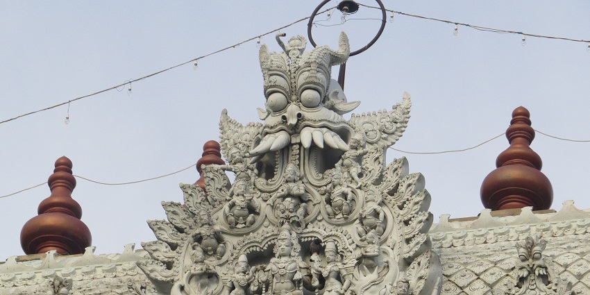 Rock cut carving of the deity at Suchindram Temple.