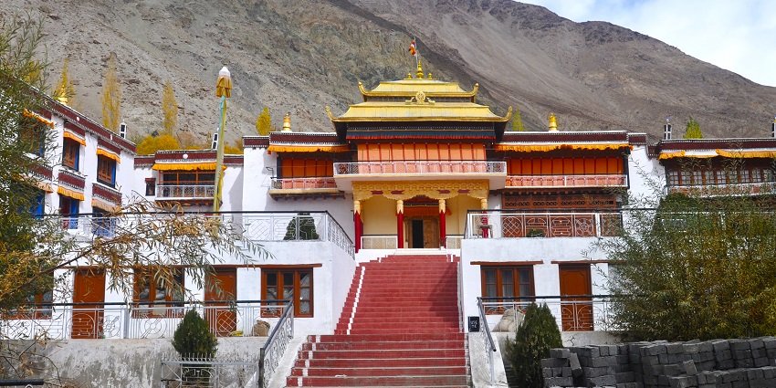 Wide angle view of the entrance of the monastery, one of the places to see for a cultural enriching experience
