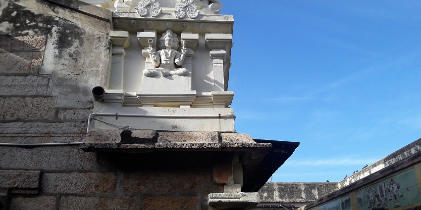 A peaceful evening at and the snapshot of the wall where the image of deity is carved