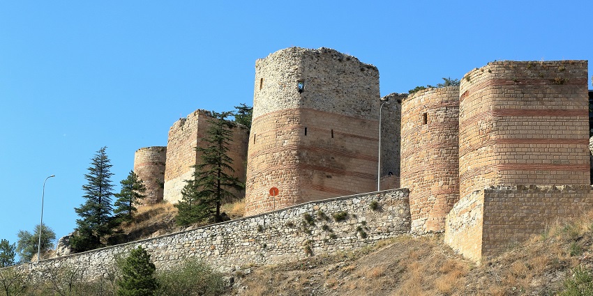 Image of an ancient fort walls under clear blue sky during day time