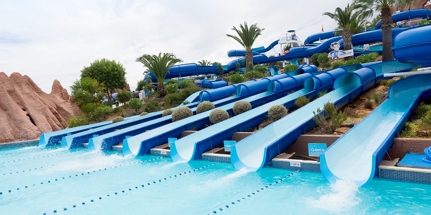 Shubham Water Park Nashik featuring multiple water slides and pools on a sunny day