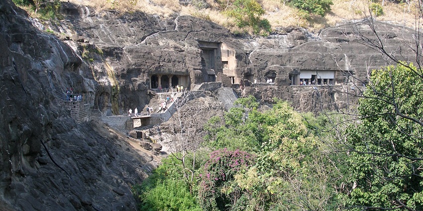 A rugged rock-cut cave perched on steep cliffs, offering breathtaking views of surrounding forts.