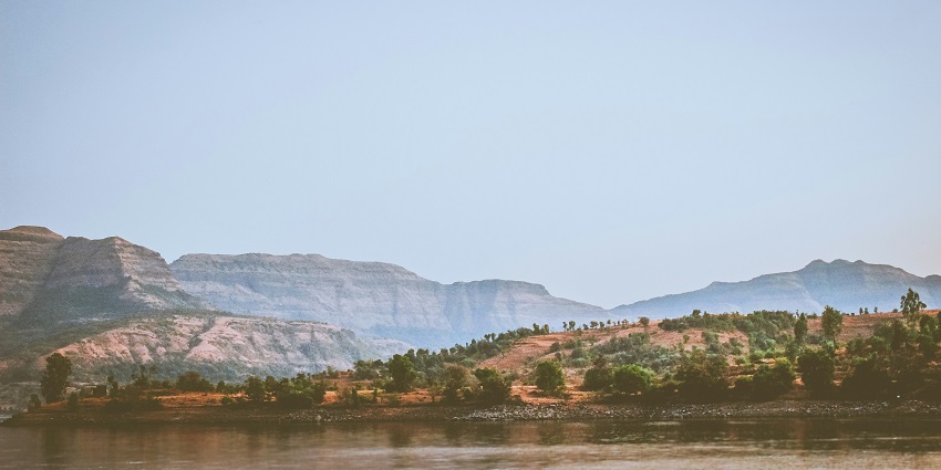 A scenic view of Bhandardara, one of the best places to visit near Mumbai in April.