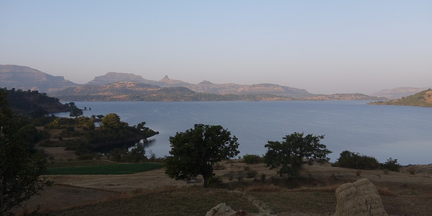 Bhandardara Lake, a scenic tourist attraction near Kalsubai , surrounded by hills