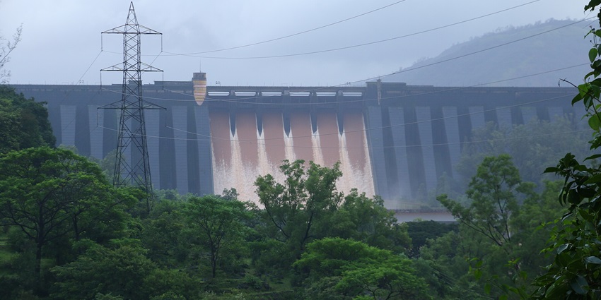 Scenic Bhavali Dam surrounded by lush green hills and water is one of the best sights to enjoy