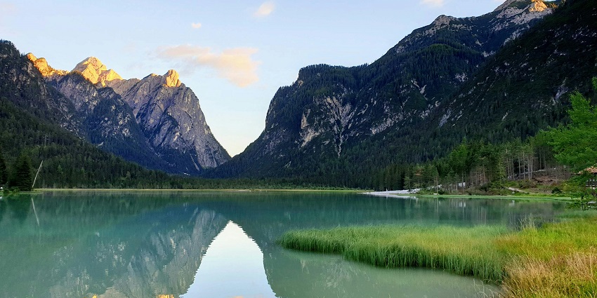 A mesmerising view of azure waters of Bheemeshwari surrounded by majestic peaks.