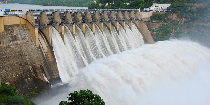 A large waterfall cascading down a dam, showcasing the powerful flow of water
