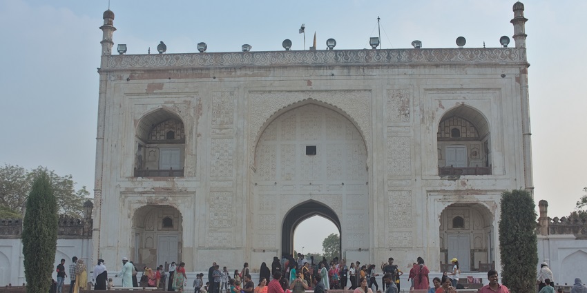 The grand entrance gate of Bibi Ka Maqbara with tourists, near Siddharth Garden and Zoo.