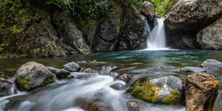 Big Steps Waterfalls featuring a serene cascade amidst nature’s untouched beauty.