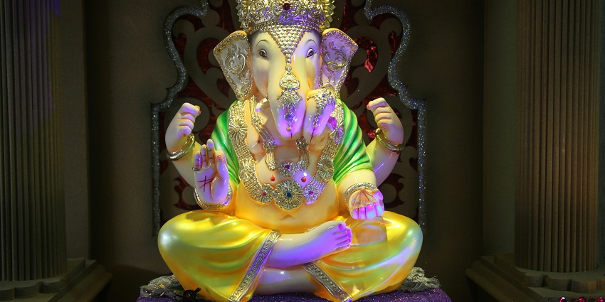 A glimpse of the Binkhambi Ganesh Temple featuring a majestic statue of Lord Ganesha.