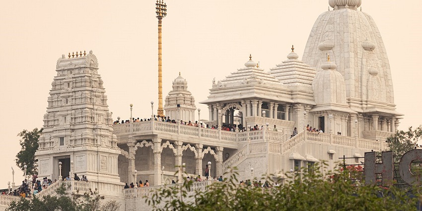 Panoramic view of the majestic monument and its flags from a distance location