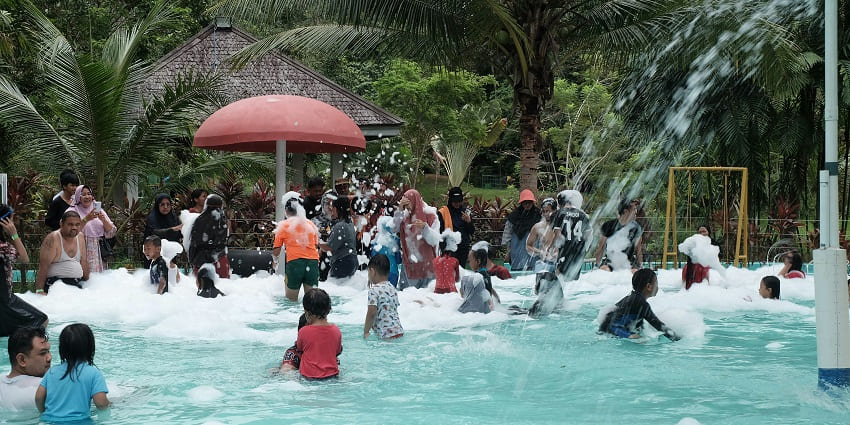 A vibrant water park with slides and pools, showcasing the popular water park in Panipat