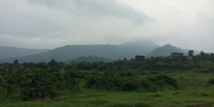 Calm waters of Morbe Dam with boats which is one of the things to do in Kajrat.
