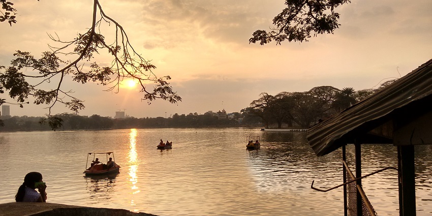 Things to do for couples in Bangalore include Boating at Ulsoor Lake featuring serene waters