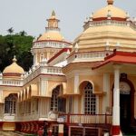 A glimpse of a famous spiritual attraction of Goa adorned with shades of orange and red.