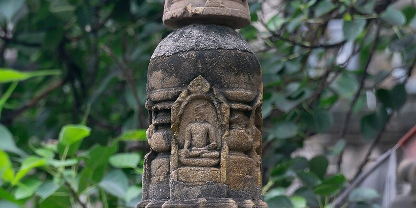 A statue of Lord Buddha seated in a meditative posture in Bodh Gaya Bihar symbolising peace.